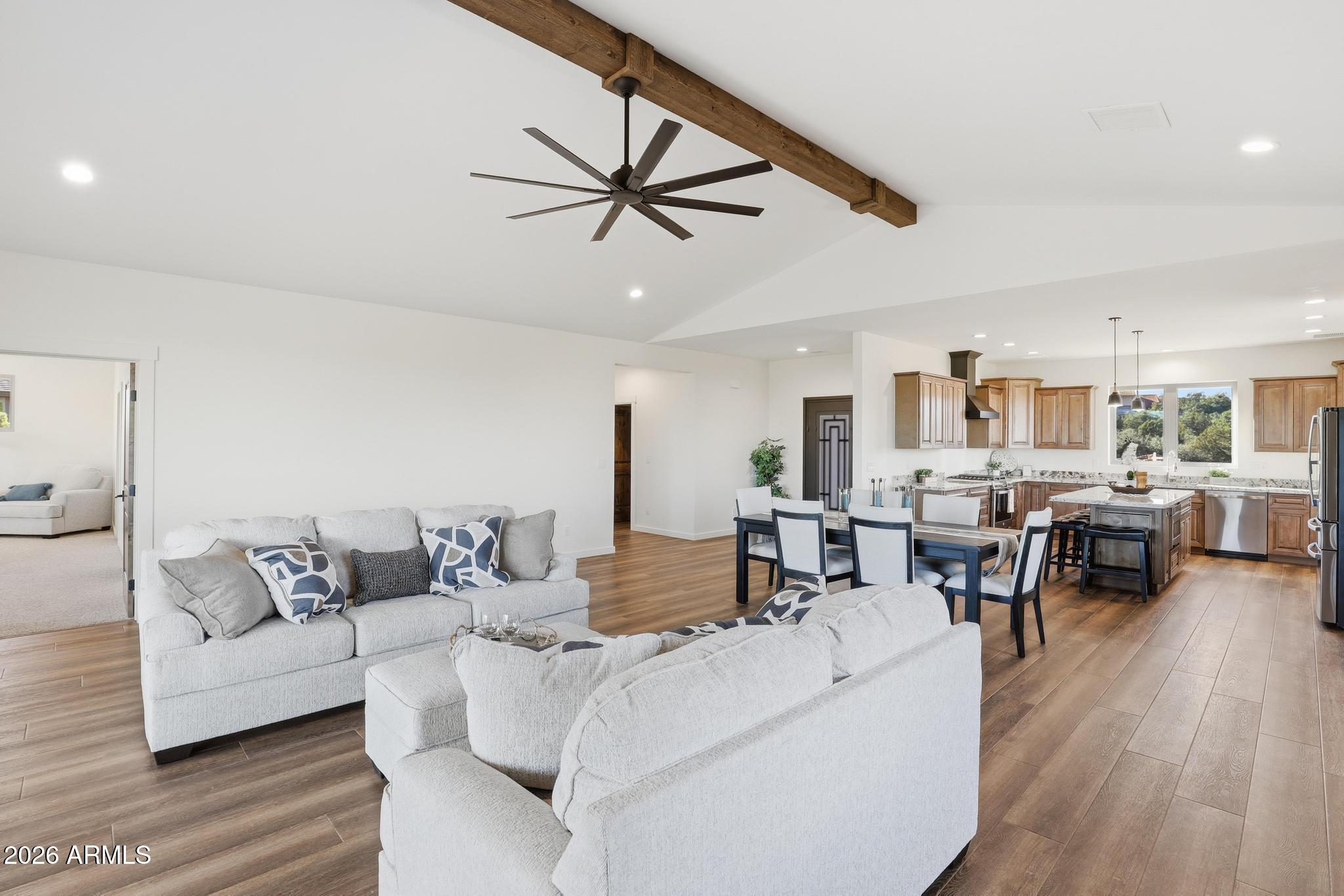 1105 South Kinzer Court Payson, AZ 85541 - Photo 13 of 44 a living room with furniture and a view of kitchen
