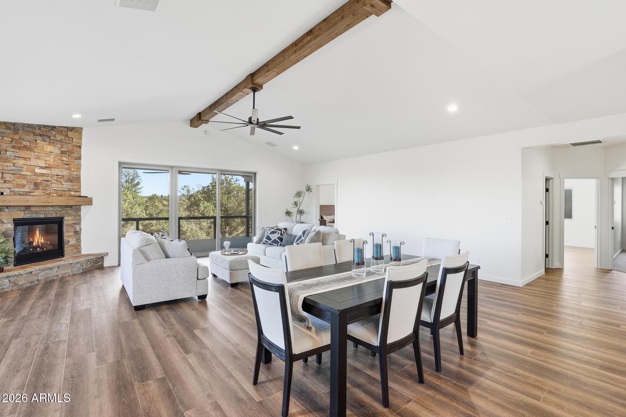1105 South Kinzer Court Payson, AZ 85541 - Photo 15 of 44 a dining room with furniture window and wooden floor