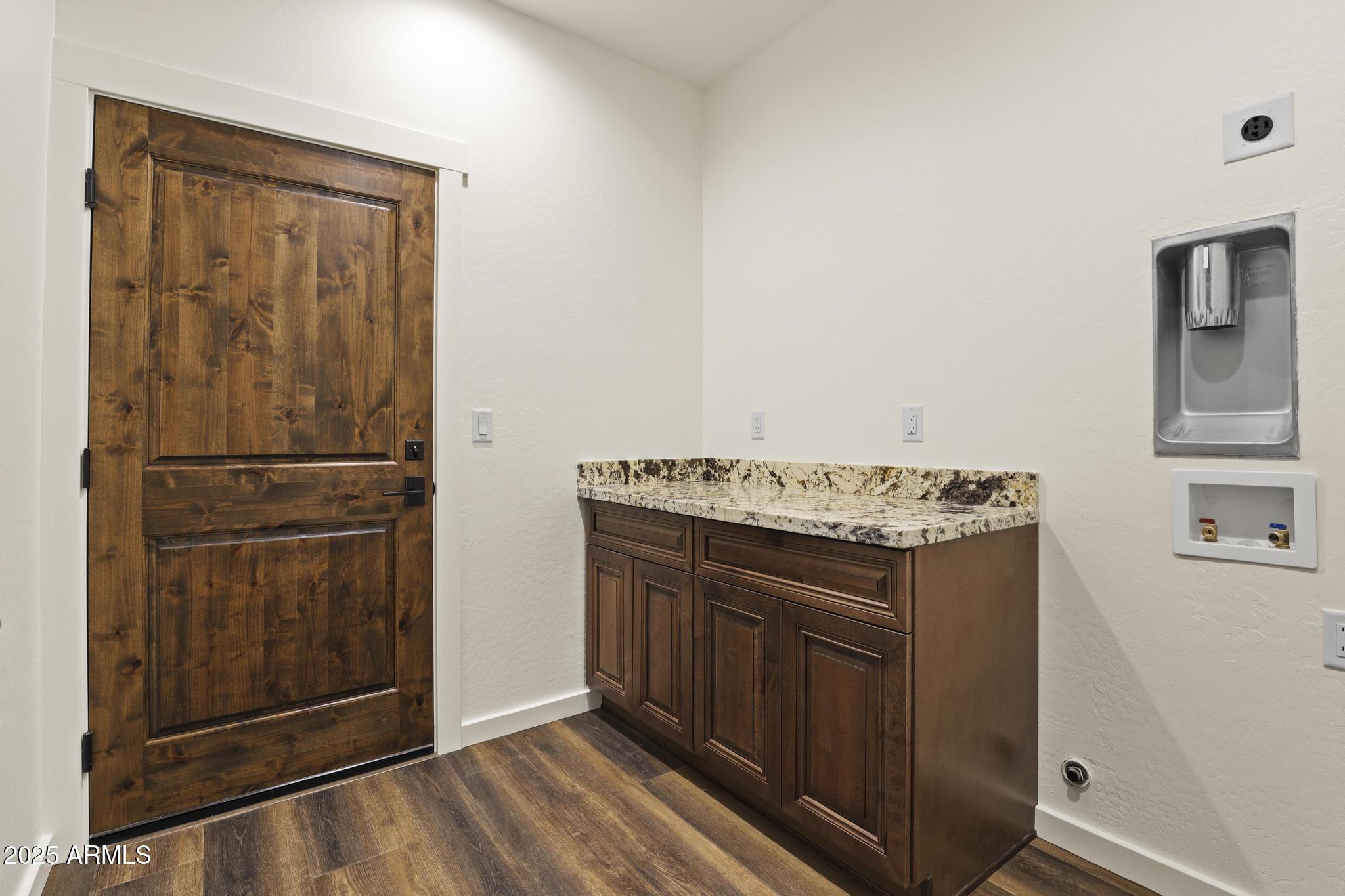 1105 South Kinzer Court Payson, AZ 85541 - Photo 29 of 44 a kitchen with stainless steel appliances granite countertop a stove and a refrigerator