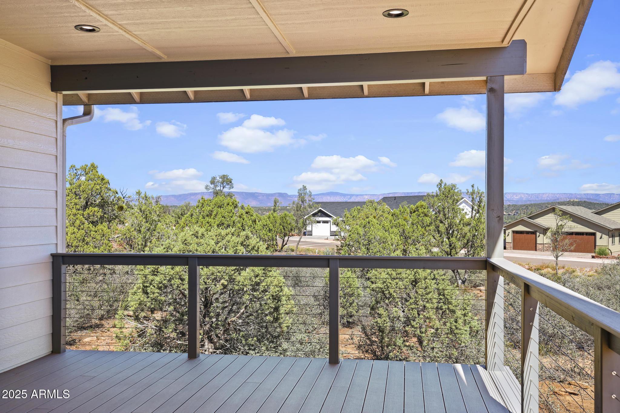 1105 South Kinzer Court Payson, AZ 85541 - Photo 33 of 44 a view of a balcony with wooden floor