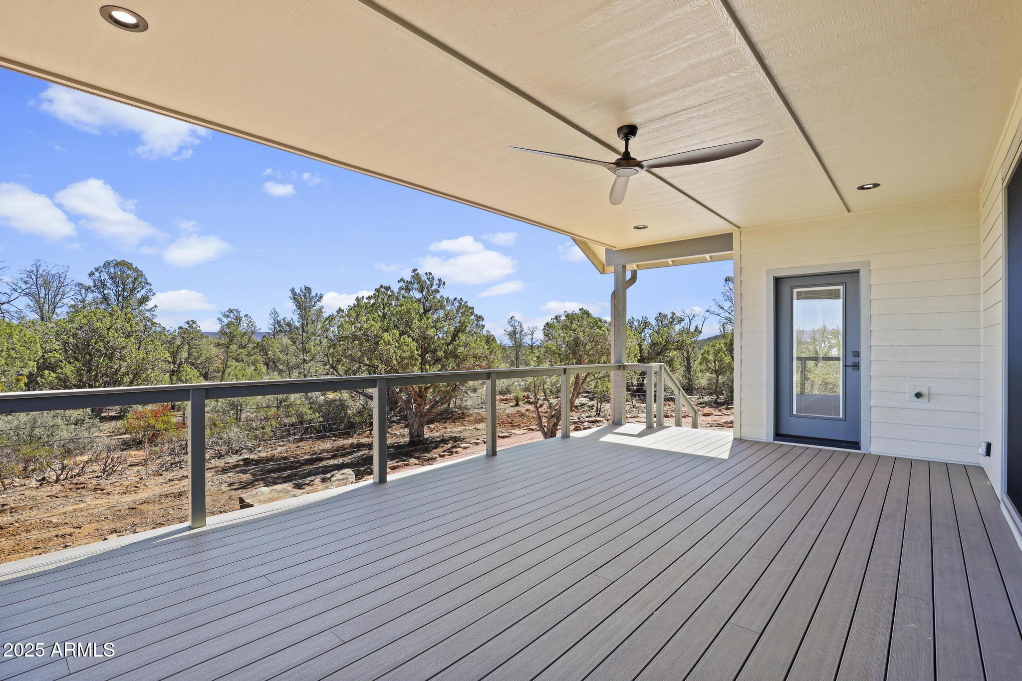 1105 South Kinzer Court Payson, AZ 85541 - Photo 34 of 44 a view of a balcony with wooden floor
