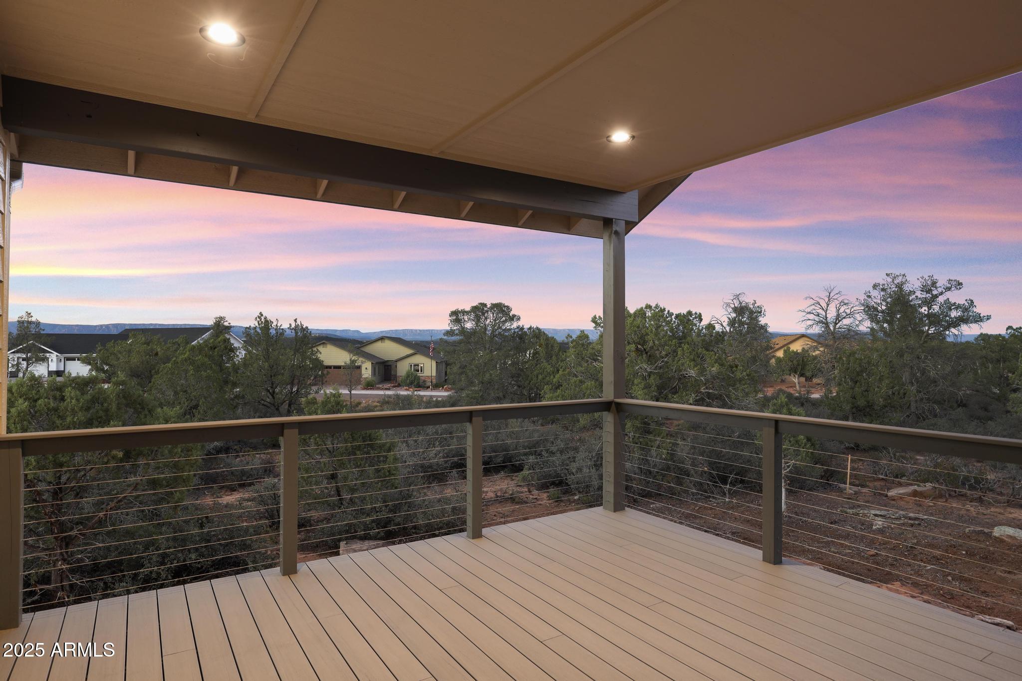 1105 South Kinzer Court Payson, AZ 85541 - Photo 35 of 44 a view of balcony with wooden floor and a potted plant