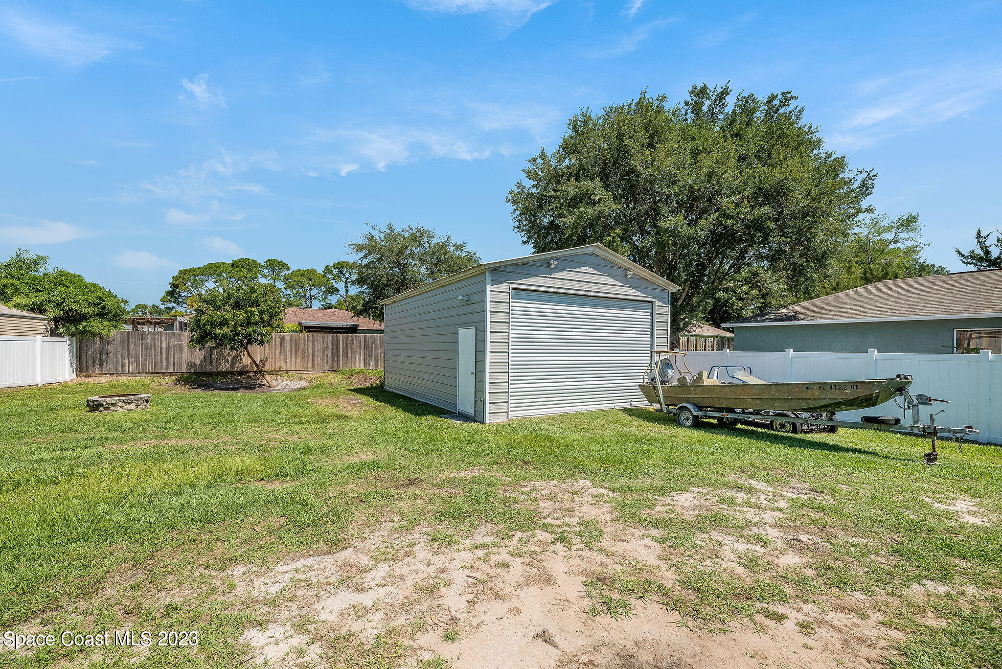 6342 Hudson Road Cocoa, FL 32927 - Photo 21 of 30 a view of a backyard with plants and a garden