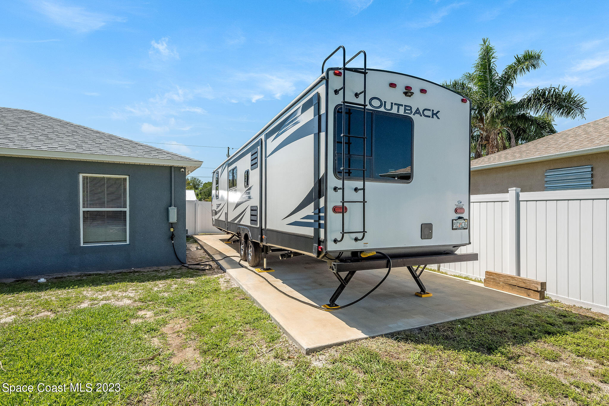 6342 Hudson Road Cocoa, FL 32927 - Photo 22 of 30 a house view with a backyard space
