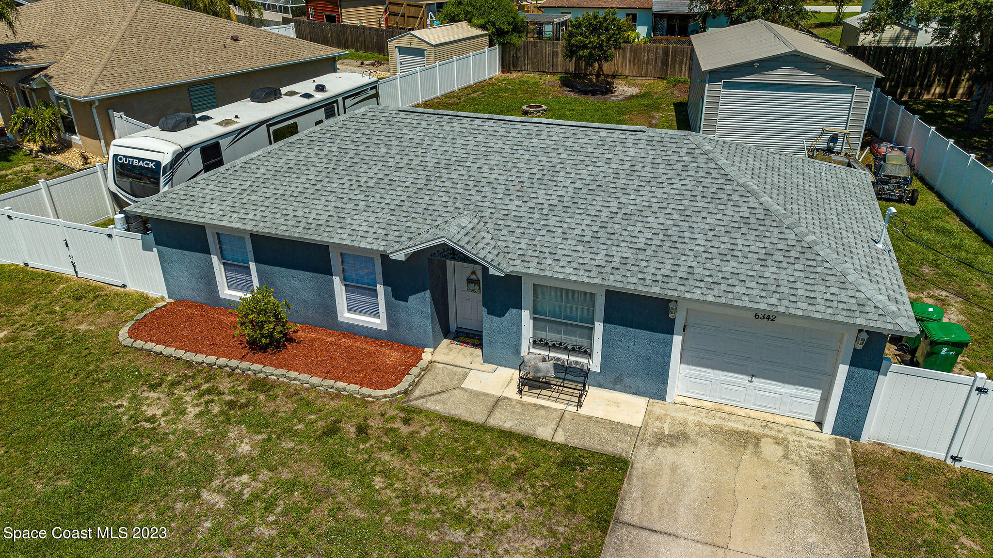 6342 Hudson Road Cocoa, FL 32927 - Photo 30 of 30 a view of house with outdoor space