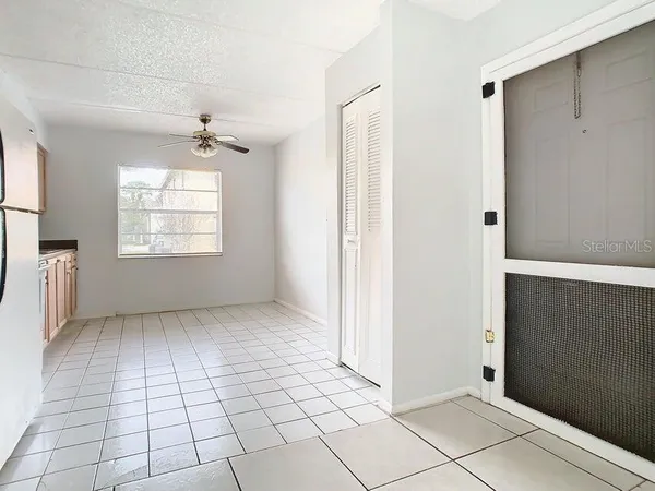 a view of an empty room and window