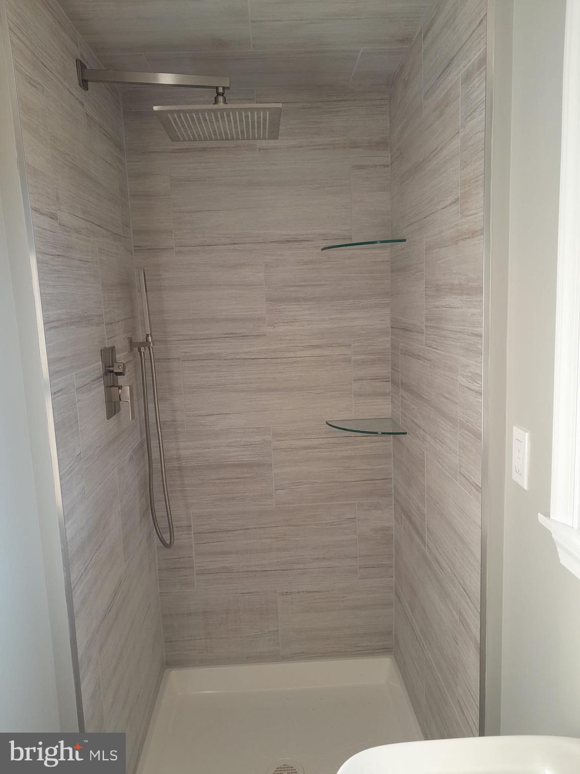 1656 Chestnut Ridge Road Upper Black Eddy, PA 18972 - Photo 12 of 32 a bathroom with a shower