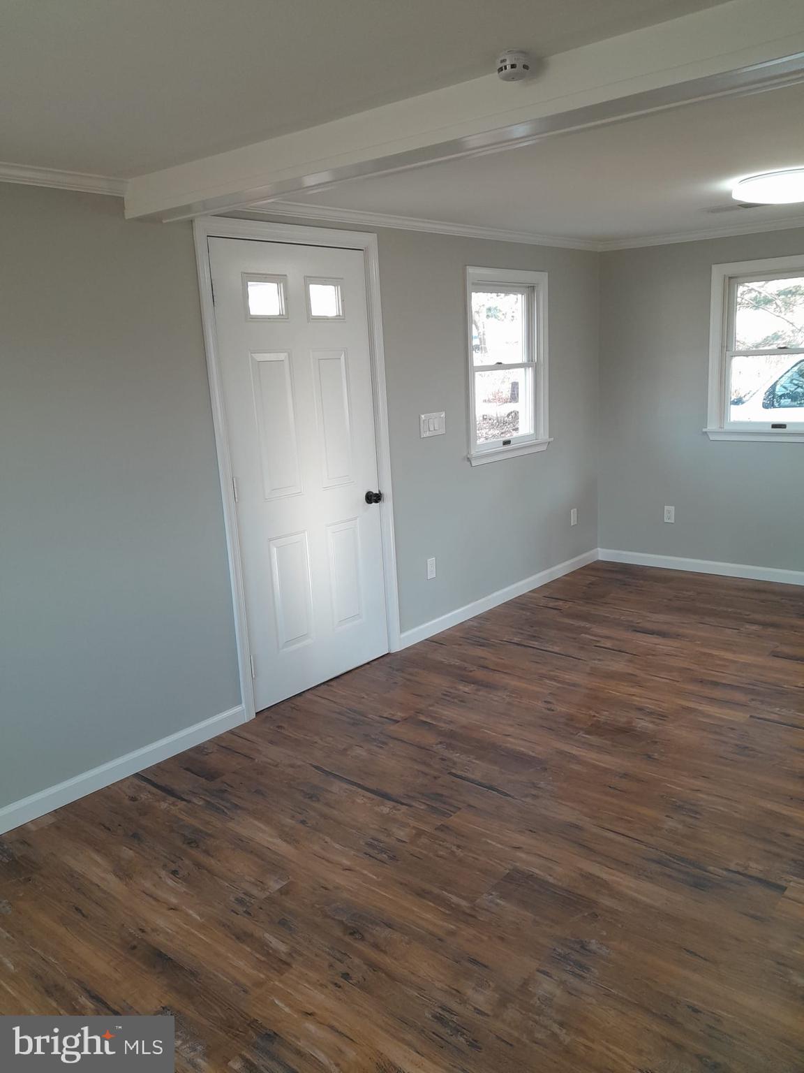 1656 Chestnut Ridge Road Upper Black Eddy, PA 18972 - Photo 15 of 32 wooden floor in an empty room with a window