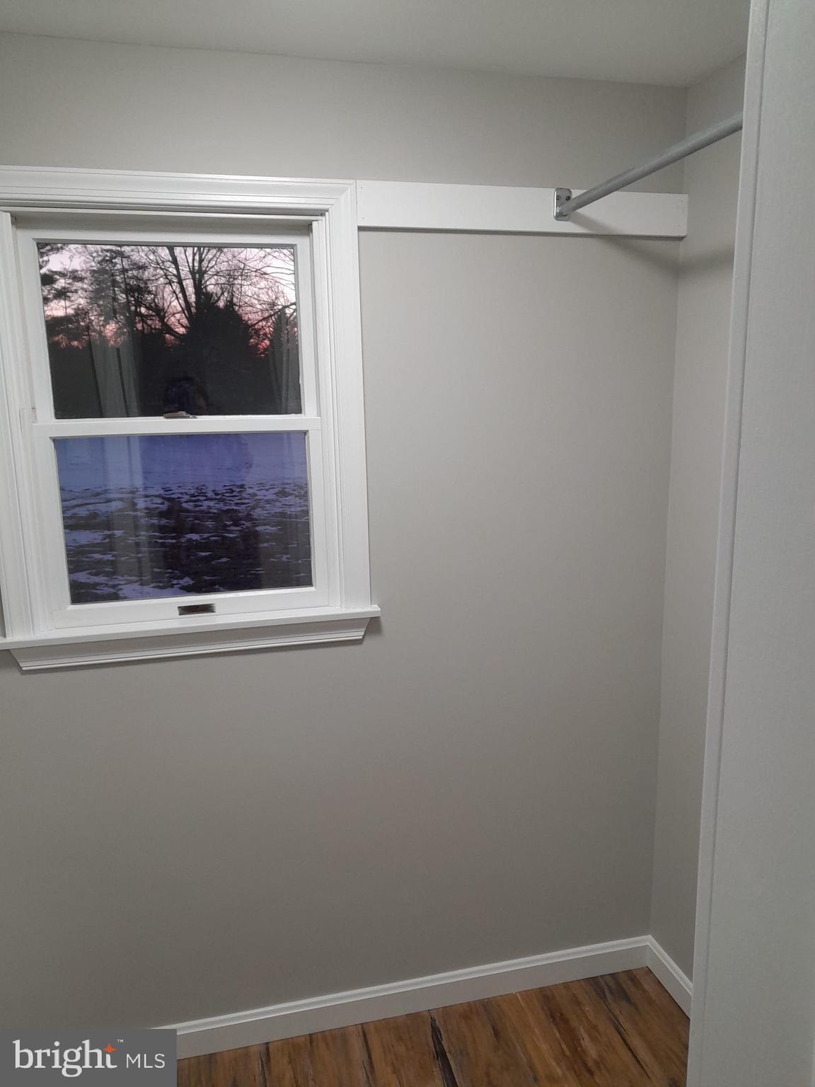 1656 Chestnut Ridge Road Upper Black Eddy, PA 18972 - Photo 19 of 32 a view of a small space with wooden floor and a window