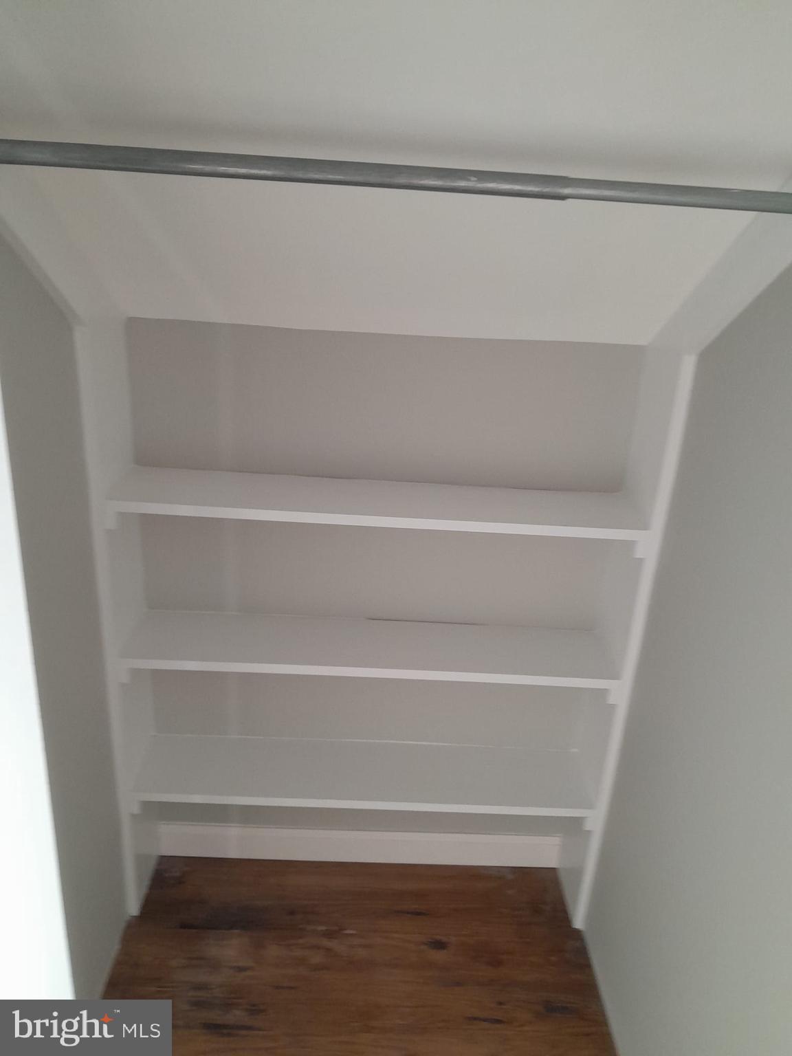 1656 Chestnut Ridge Road Upper Black Eddy, PA 18972 - Photo 28 of 32 a view of walk in closet with empty racks