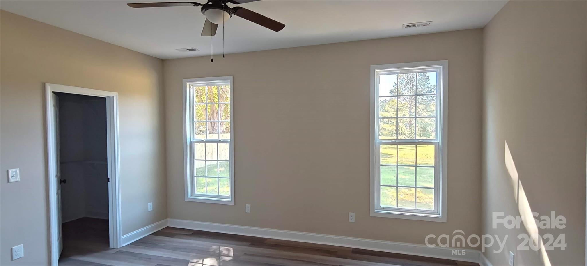 9649 Stokes Ferry Road Gold Hill, NC 28071 - Photo 11 of 17 a view of an empty room with a window