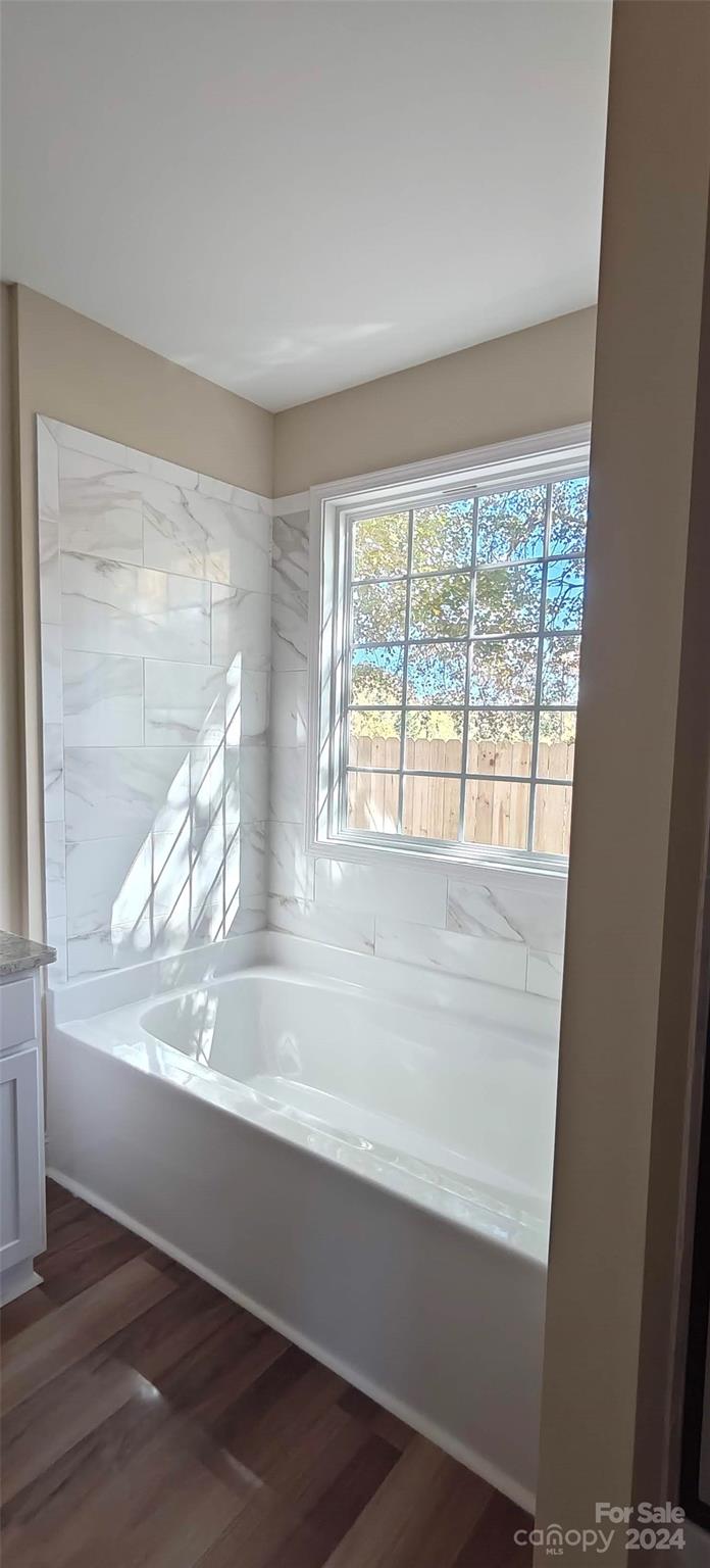9649 Stokes Ferry Road Gold Hill, NC 28071 - Photo 14 of 17 a view of a bathtub in a room