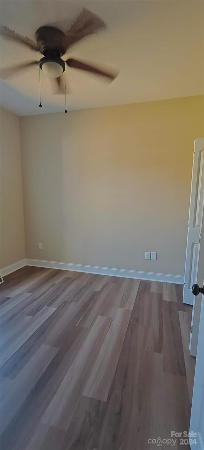 9649 Stokes Ferry Road Gold Hill, NC 28071 - Photo 16 of 17 a view of a room with wooden floor