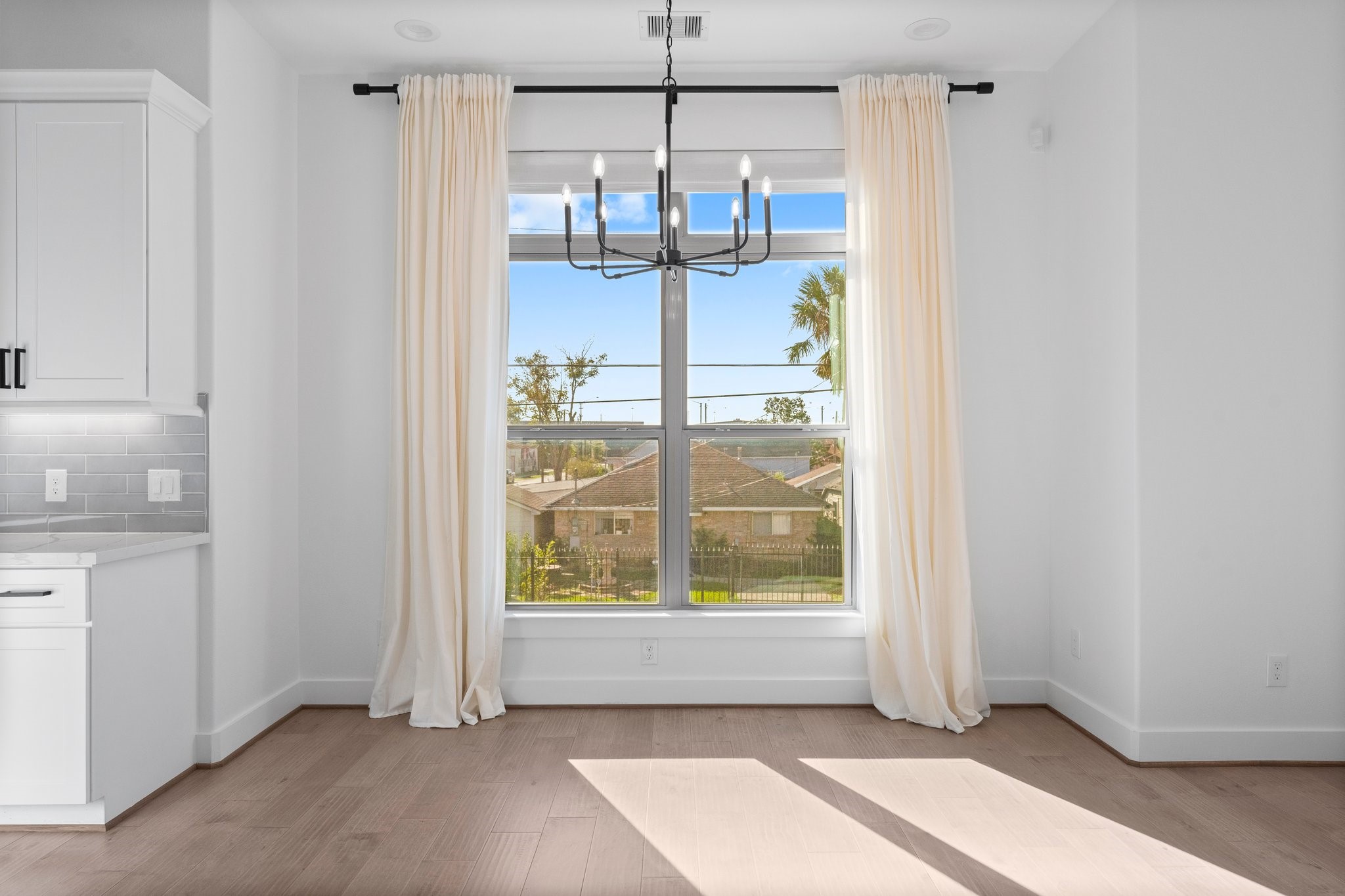 1602 Chestnut Street Houston, TX 77009 - Photo 21 of 49 a view of an empty room with a window