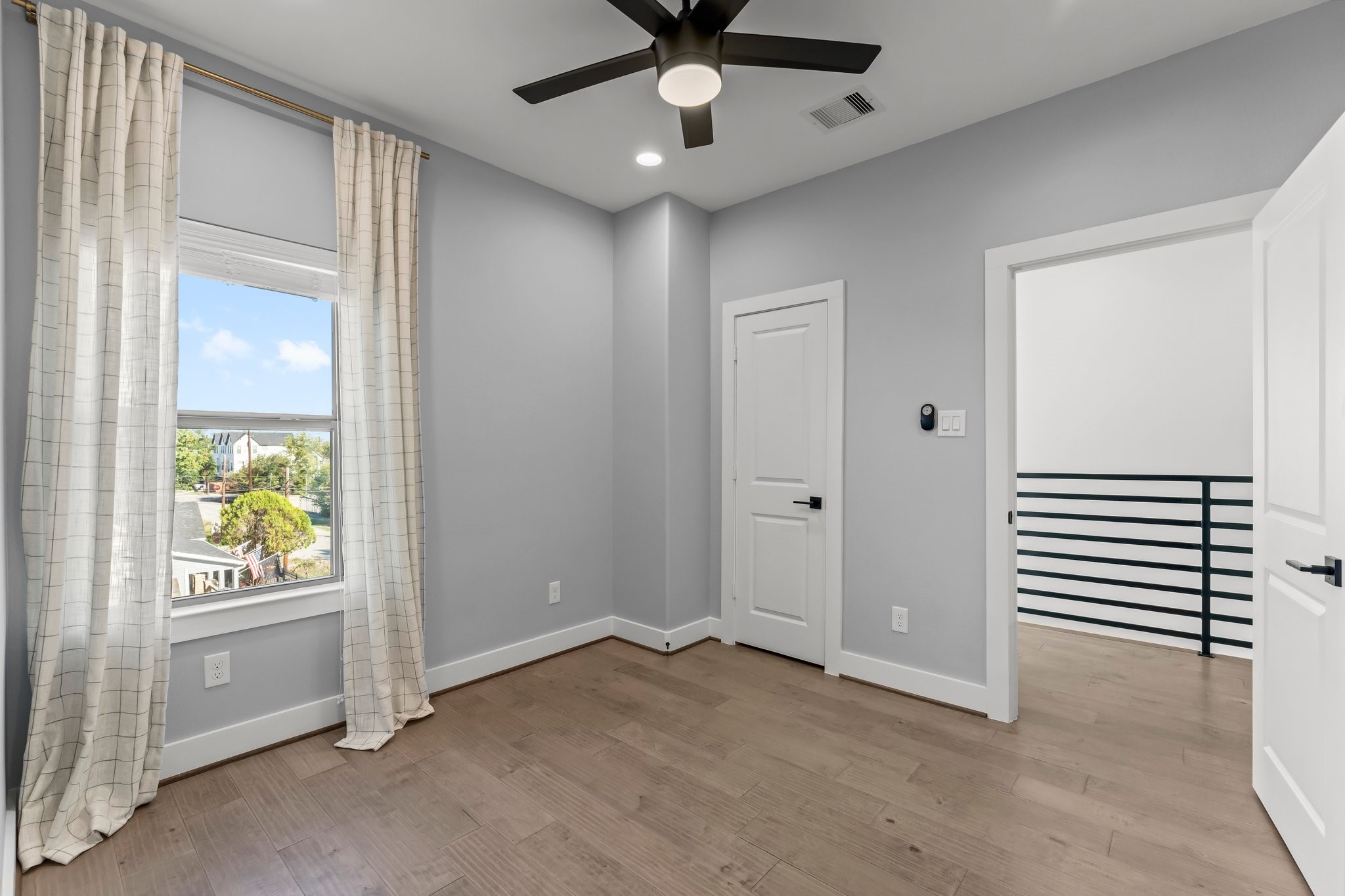 1602 Chestnut Street Houston, TX 77009 - Photo 28 of 49 an empty room with windows and closet