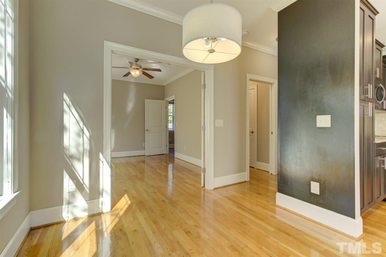 422 Heather Drive Raleigh, NC 27606 - Photo 13 of 30 The view from the Dining Room Edge looking into the Sun Room