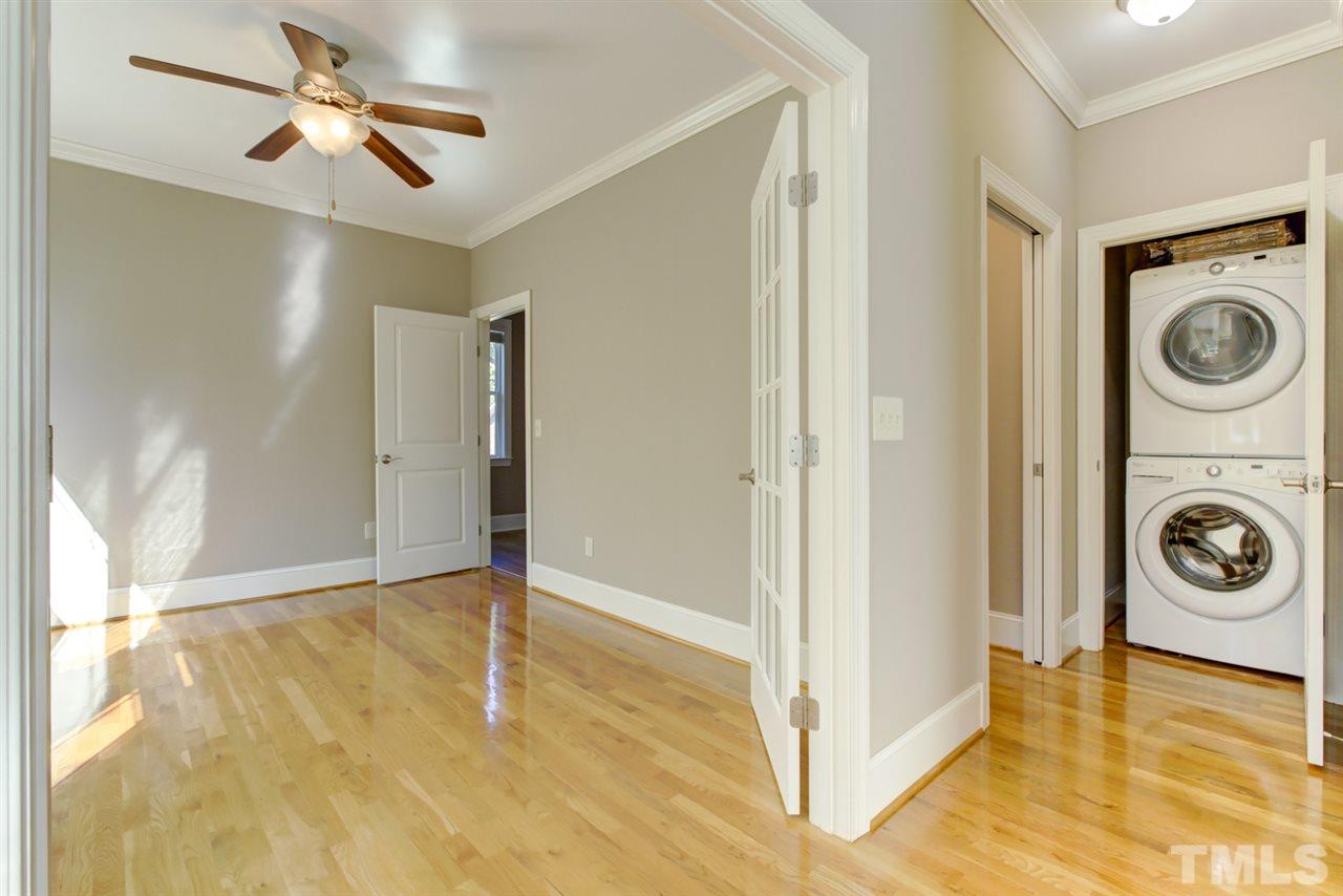 422 Heather Drive Raleigh, NC 27606 - Photo 14 of 30 Looking into the Sun Room with a view of the Laundry Closet