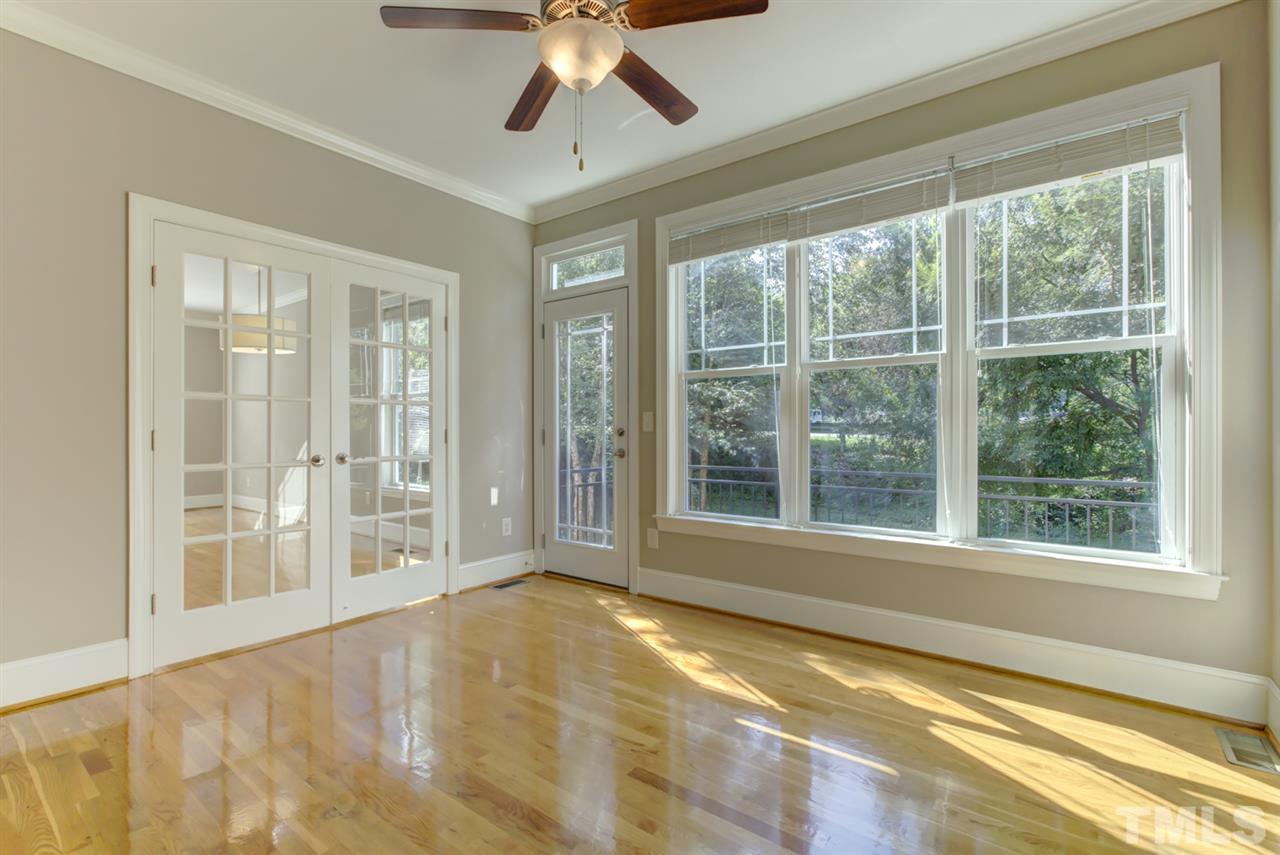 422 Heather Drive Raleigh, NC 27606 - Photo 17 of 30 Sun Room with access to deck.
