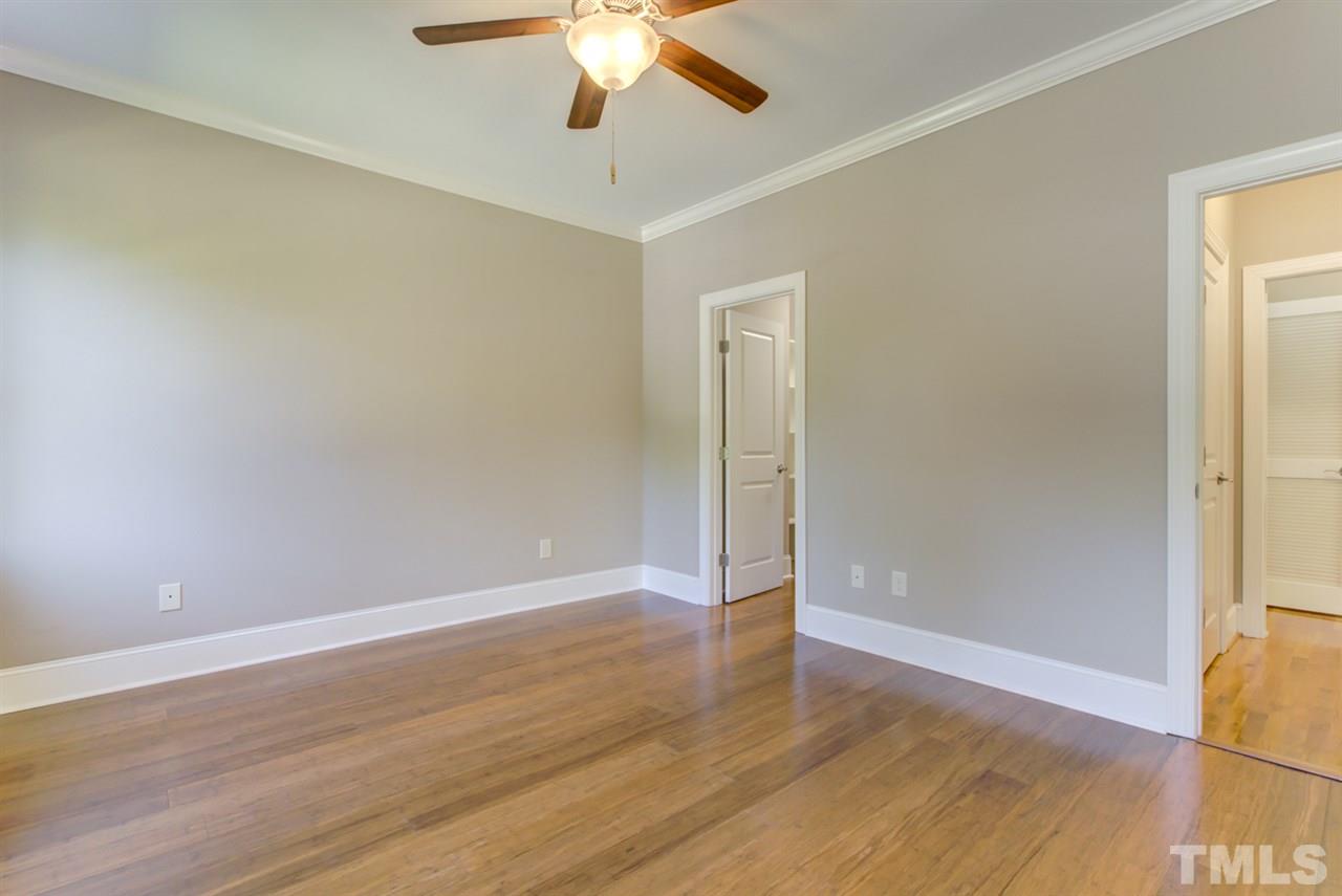 422 Heather Drive Raleigh, NC 27606 - Photo 19 of 30 Primary Bedroom features bamboo flooring