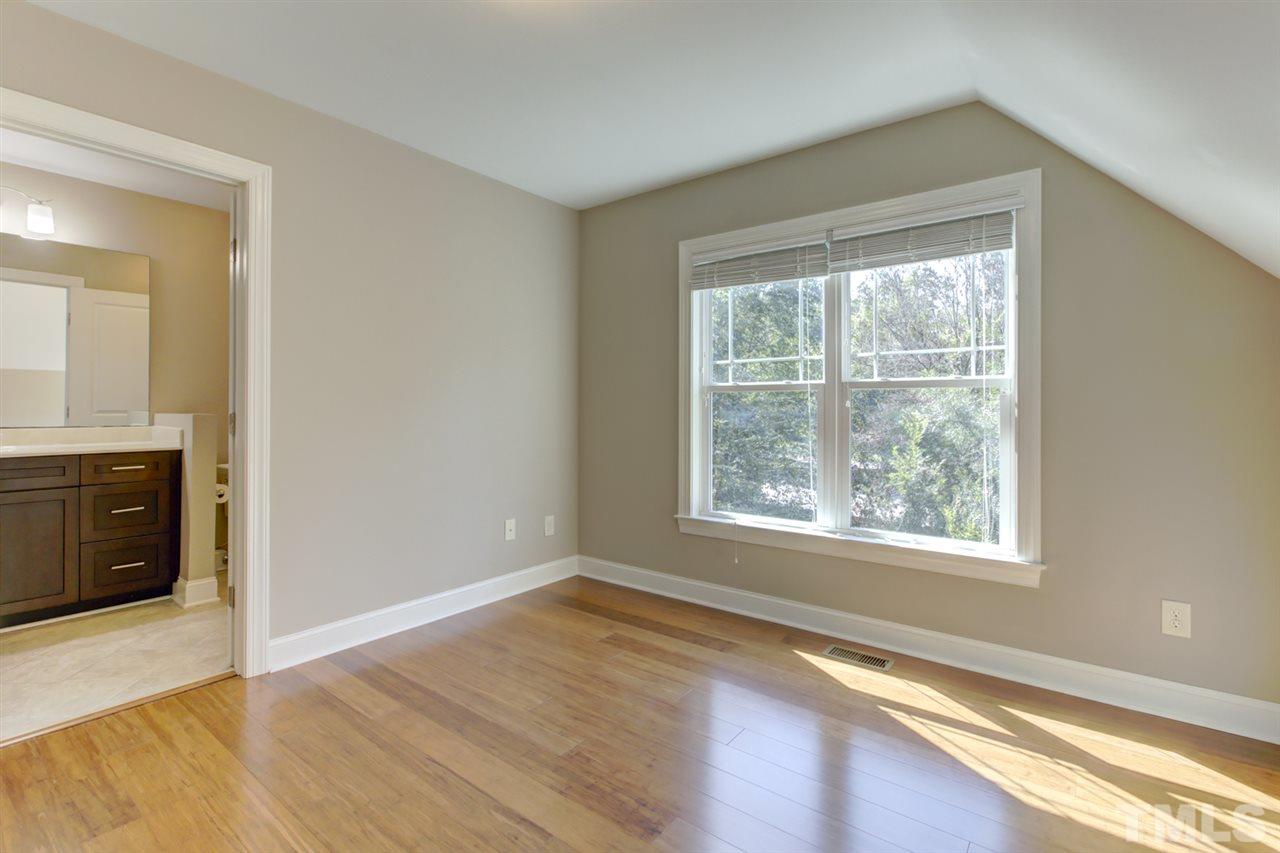 422 Heather Drive Raleigh, NC 27606 - Photo 23 of 30 Second Floor Bedroom with direct access to bathroom.