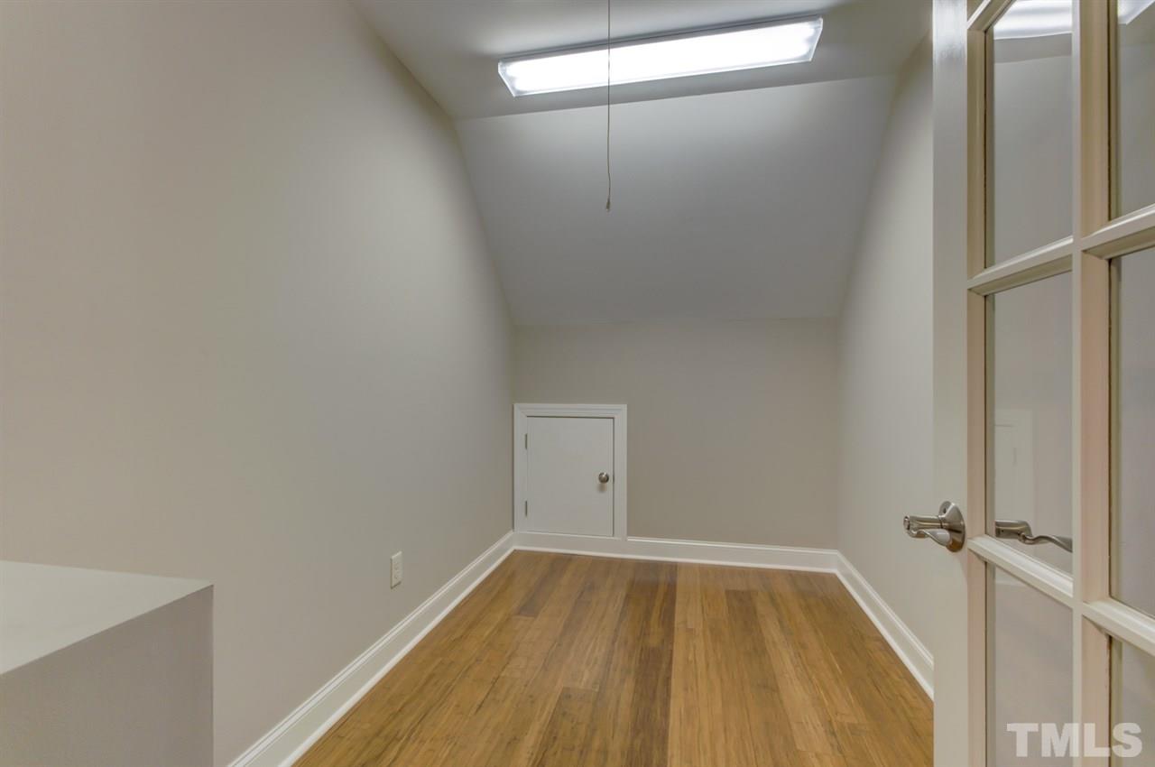 422 Heather Drive Raleigh, NC 27606 - Photo 27 of 30 Storage Room with attic and eaves access.