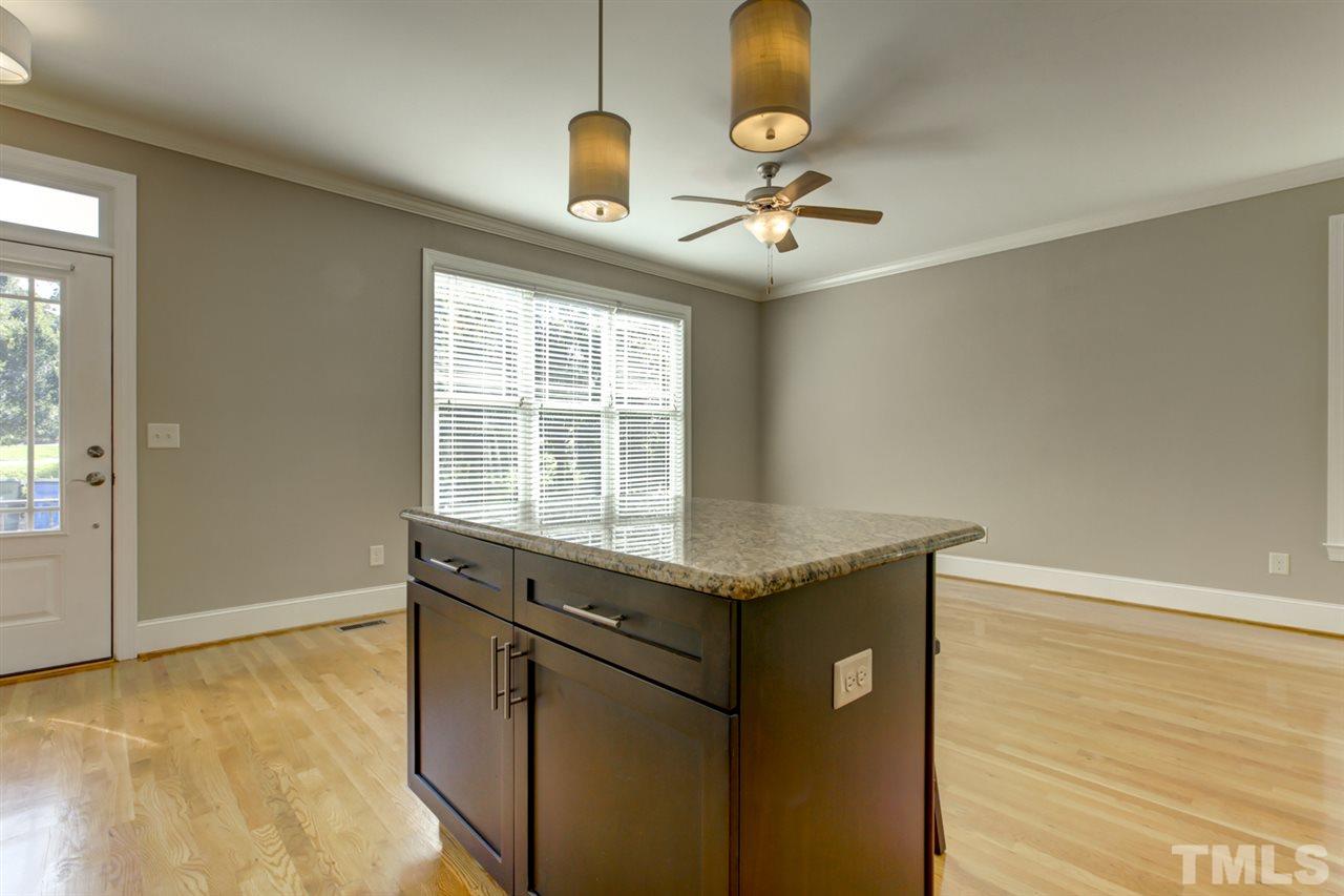 422 Heather Drive Raleigh, NC 27606 - Photo 9 of 30 Living Room area as viewed from Kitchen