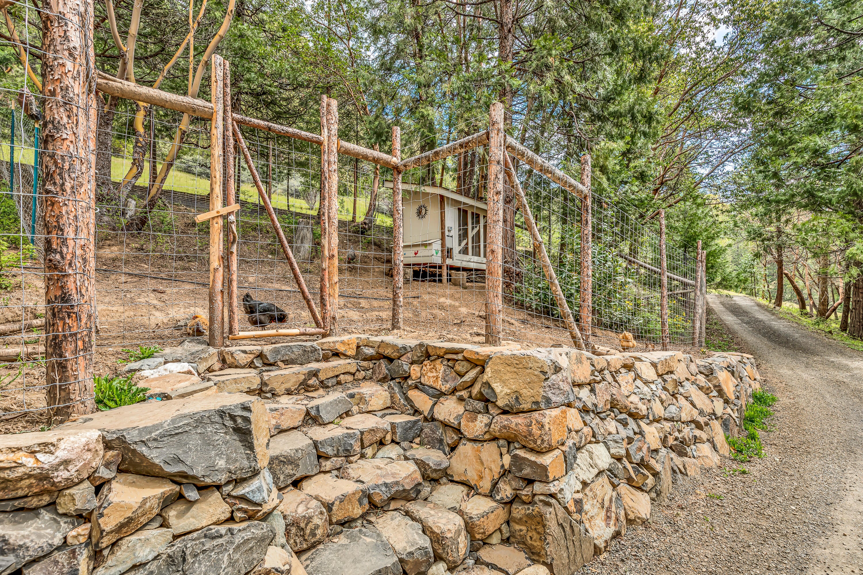 3142 Anderson Creek Road Talent, OR 97540 - Photo 39 of 46 Garden rock wall and fence