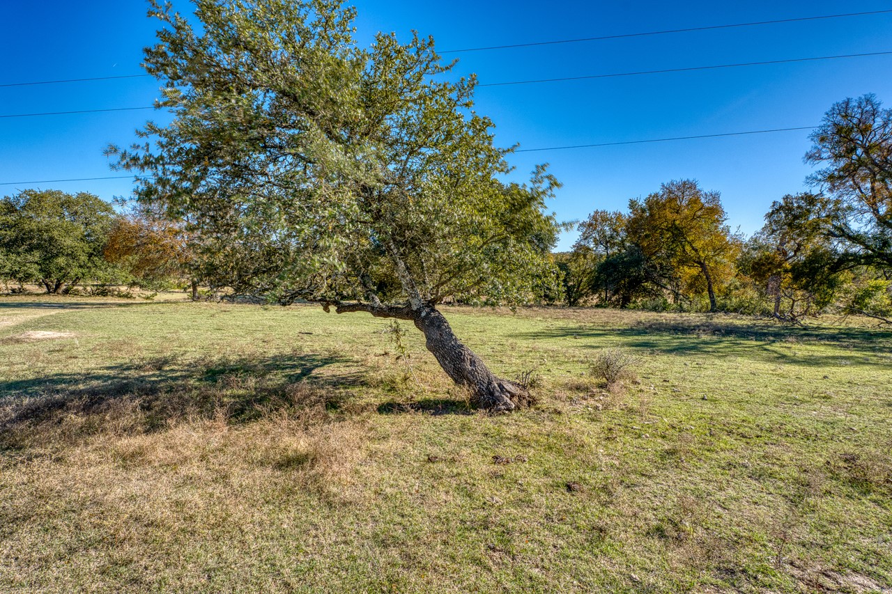 20949 Firefly Road Salado, TX 76571 - Photo 11 of 25 a view of a lake with a yard