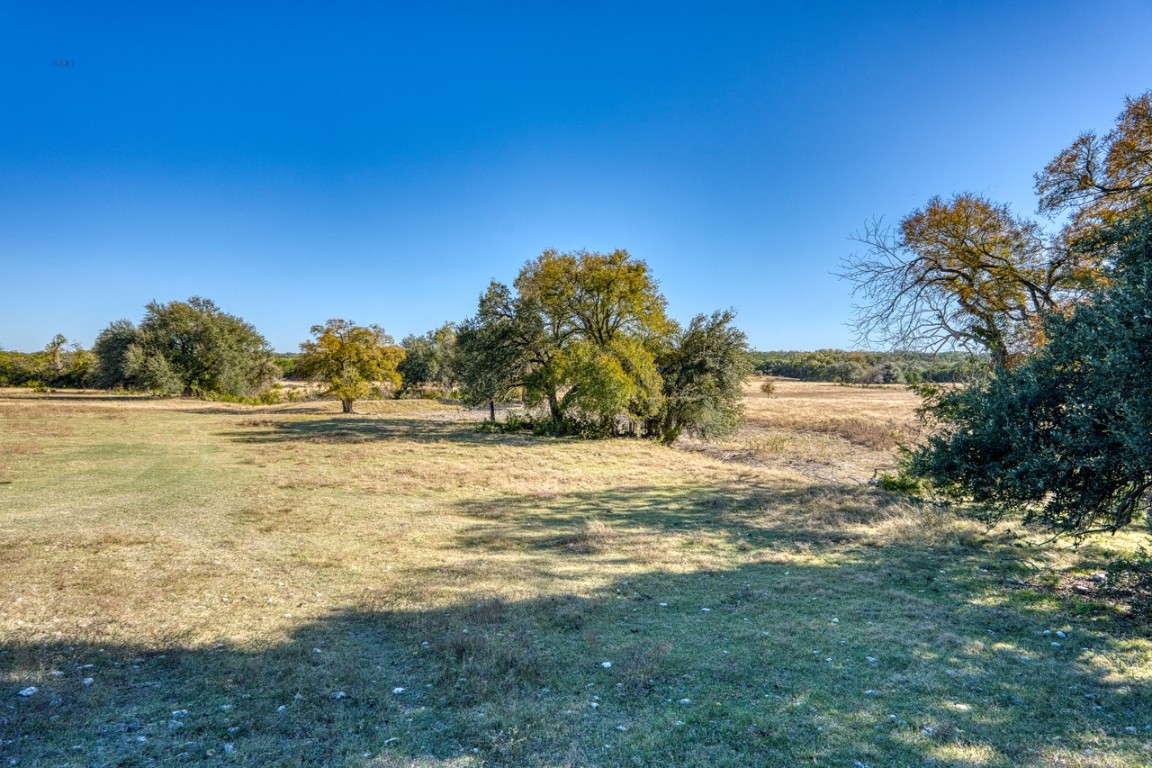 20949 Firefly Road Salado, TX 76571 - Photo 14 of 25 a view of a lake with a big yard