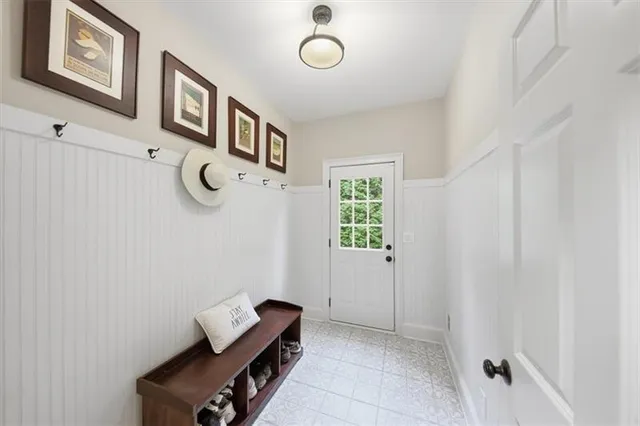 an aerial view of multiple houses with yard