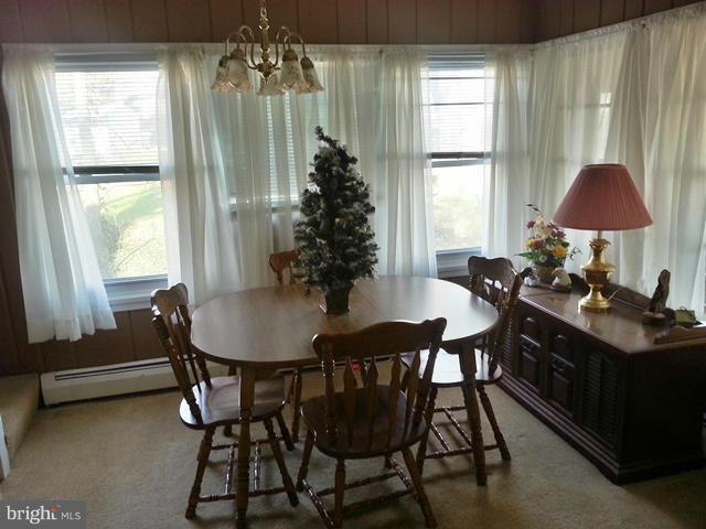 6003 Hill Road St. Leonard, MD 20685 - Photo 14 of 19 a dining room with furniture and window
