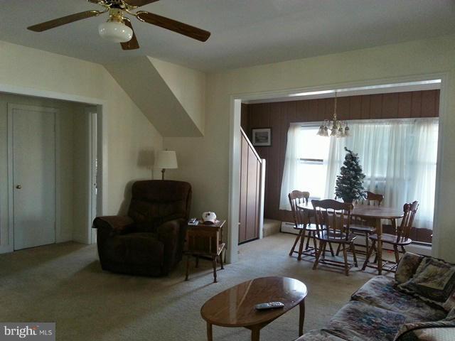 6003 Hill Road St. Leonard, MD 20685 - Photo 6 of 19 a living room with furniture and a large window