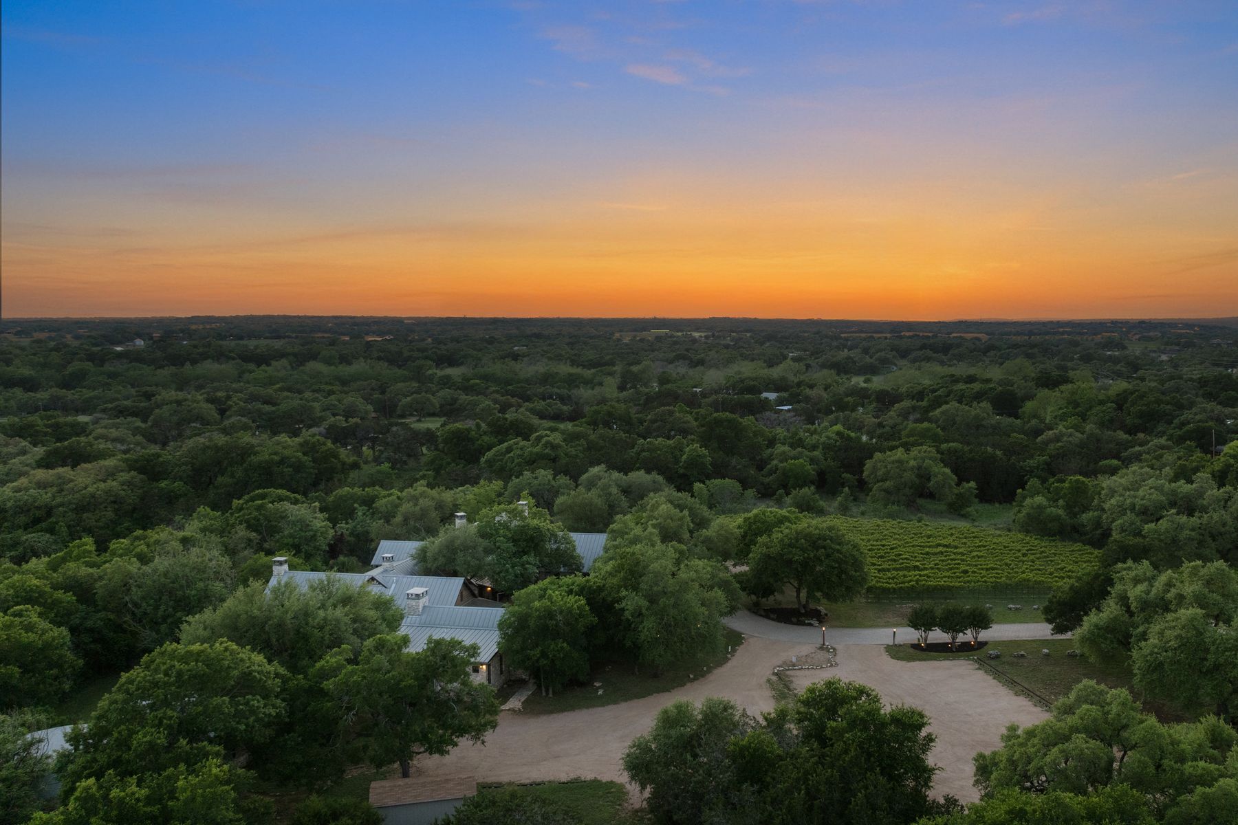 18059 Ranch To Market Road 1826 Buda, TX 78610 - Photo 38 of 39 Aerial view at dusk of a view of trees