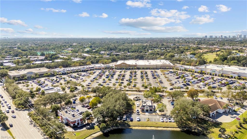 2419 Pinewoods Circle, Unit 11 Naples, FL 34105 - Photo 32 of 32 an aerial view of multiple house