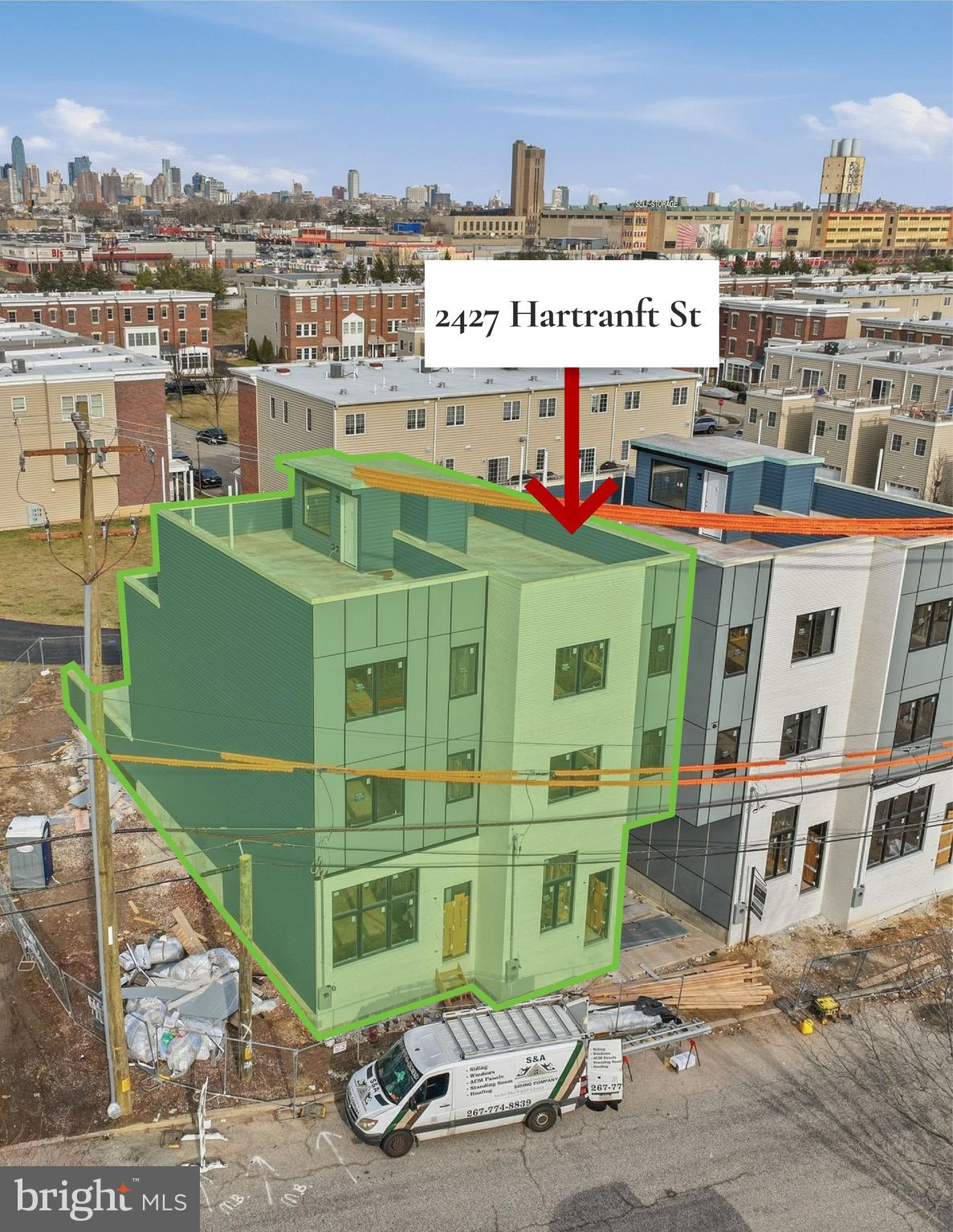 2427 Hartranft Street Philadelphia, PA 19145 - Photo 13 of 20 a front view of a building with glass windows and door