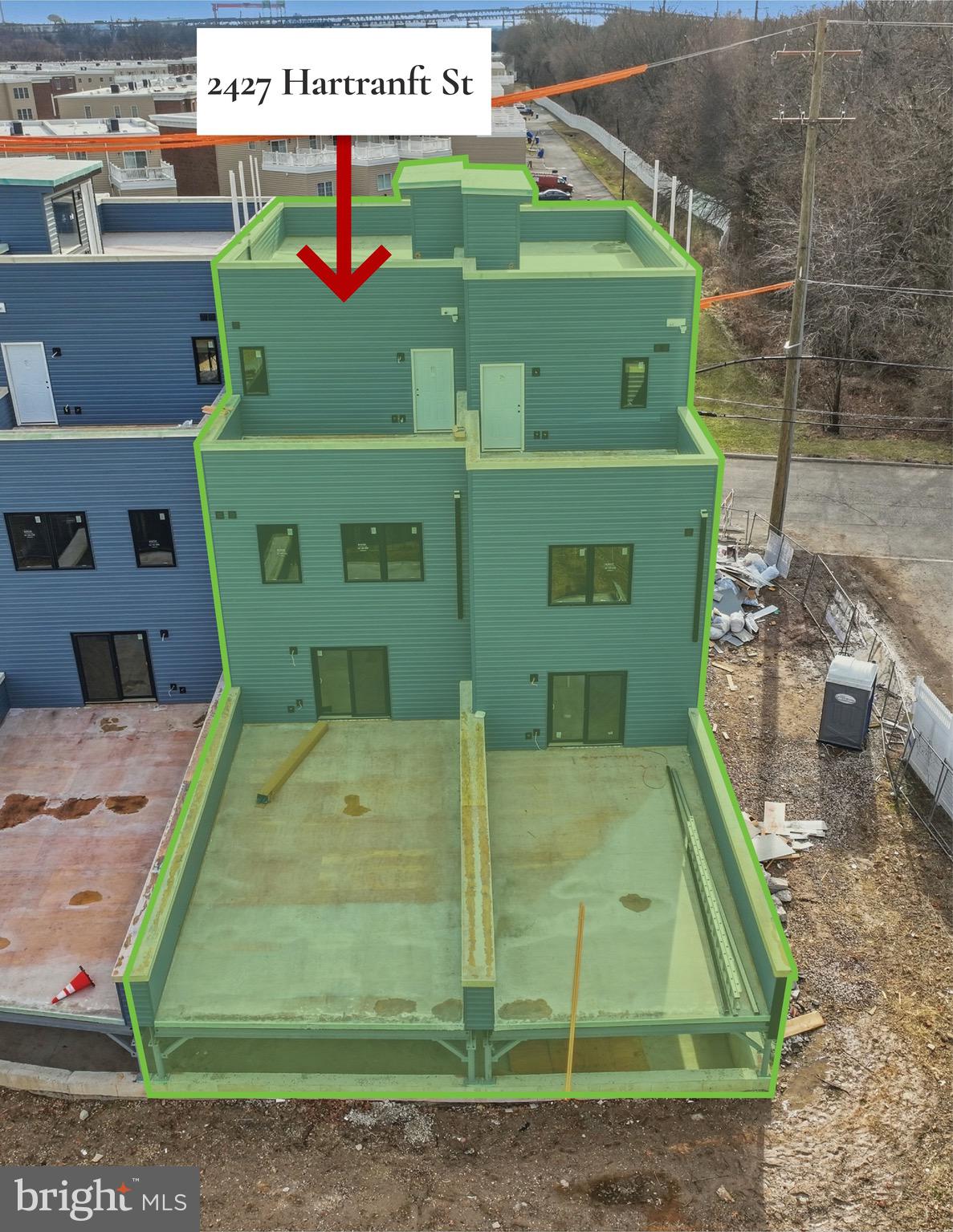 2427 Hartranft Street Philadelphia, PA 19145 - Photo 14 of 20 a green truck parked in front of a building