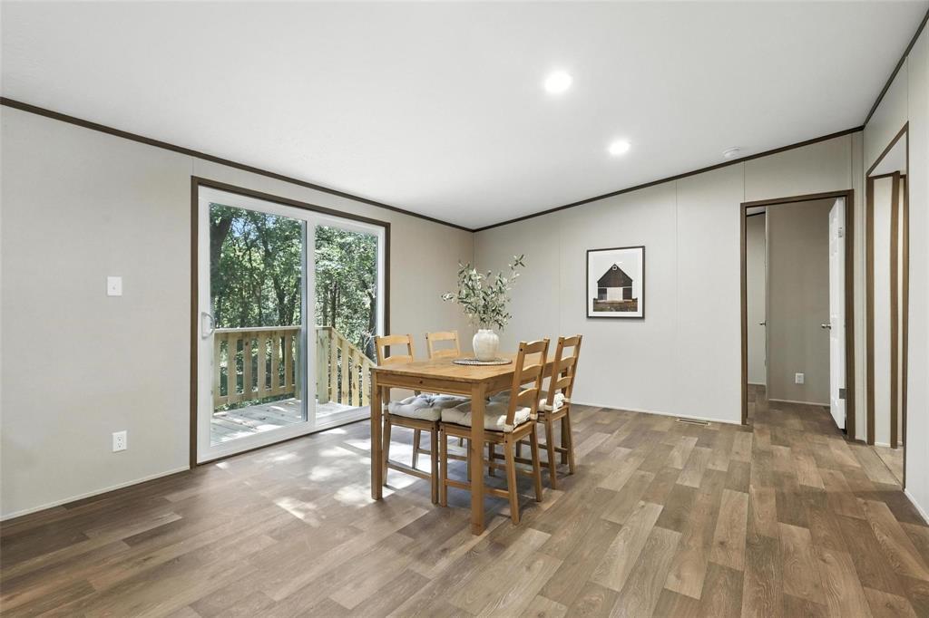 131 Kelly Court Azle, TX 76020 - Photo 13 of 22 a dining room with furniture and window