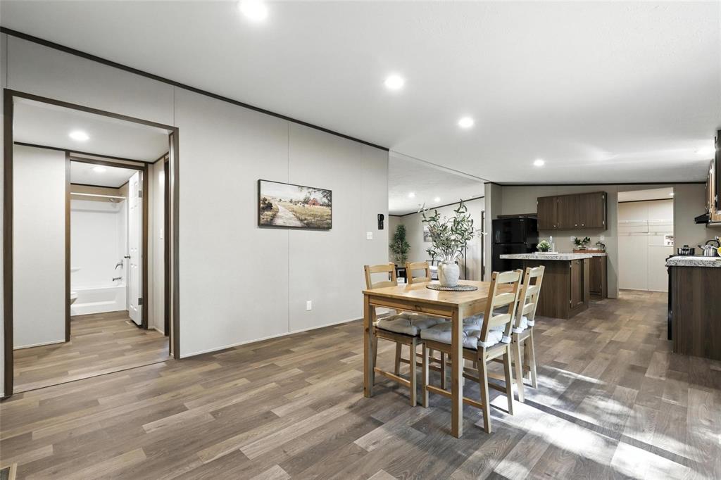 131 Kelly Court Azle, TX 76020 - Photo 14 of 22 a view of a dining room with furniture