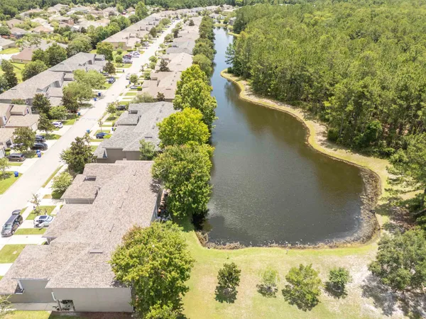 a view of a lake with a house