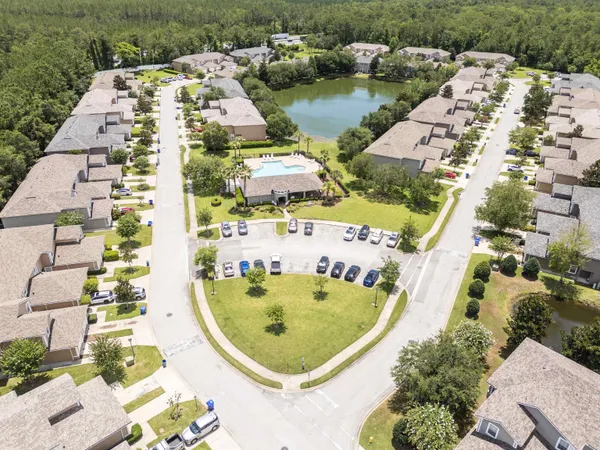 an aerial view of house with yard