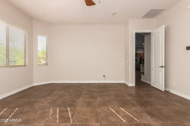 a large kitchen with kitchen island a sink stainless steel appliances and cabinets