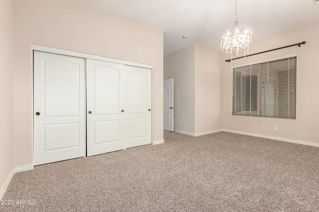 a white bath tub with a shower