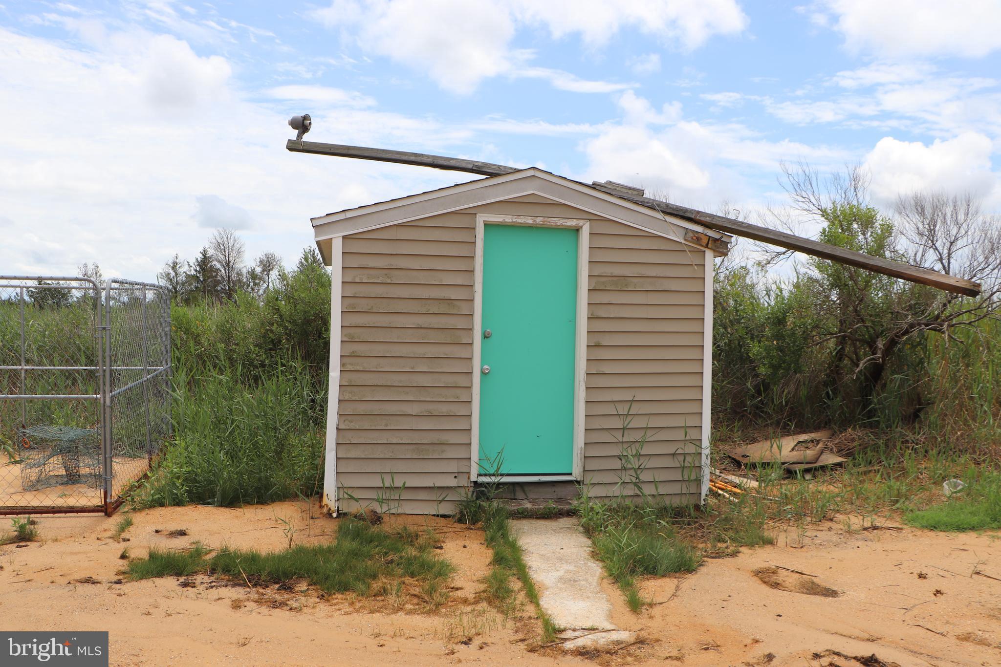 2846 Calvary Road Crisfield, MD 21817 - Photo 20 of 34 Storage shed
