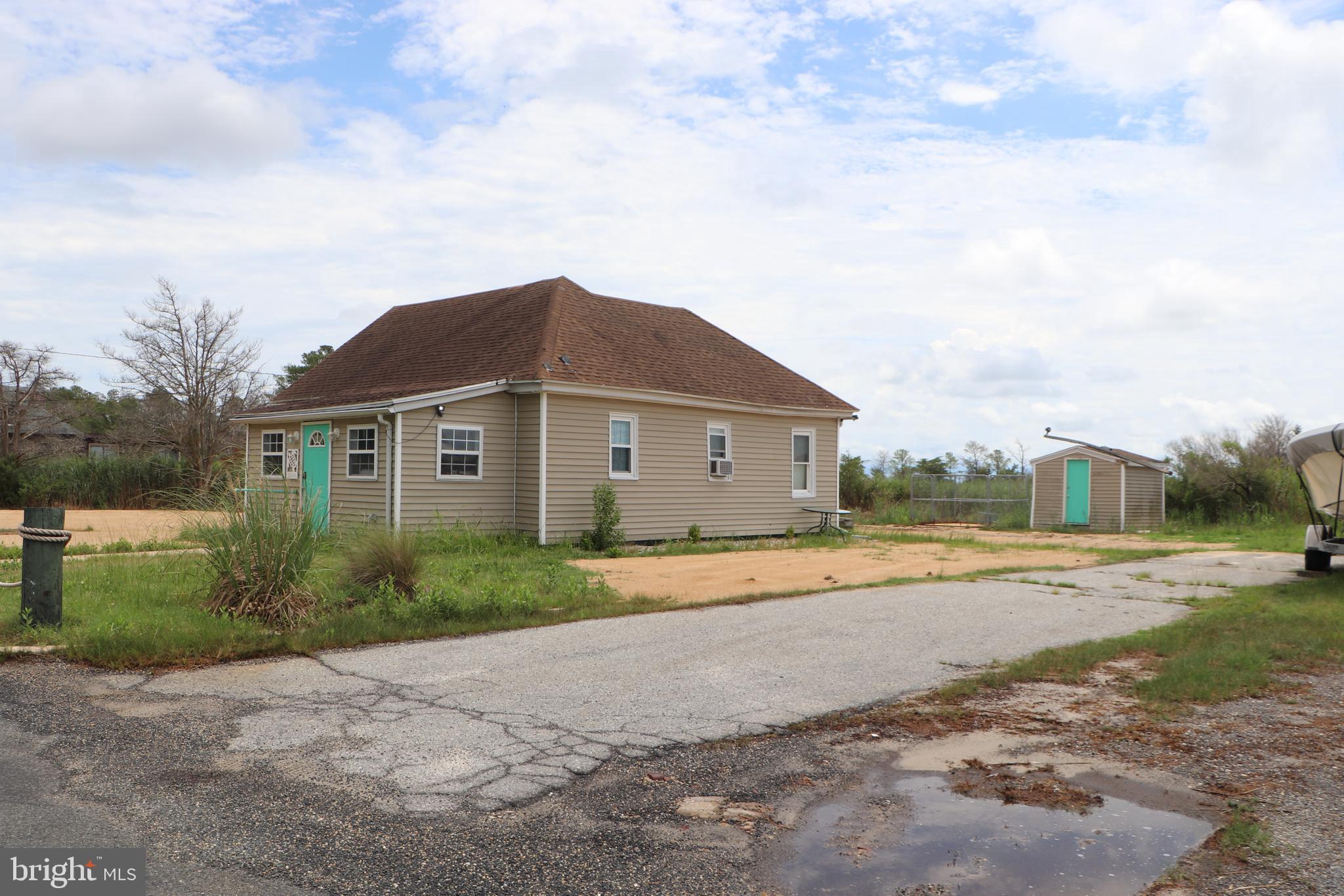 2846 Calvary Road Crisfield, MD 21817 - Photo 31 of 34 Side view of driveway and house