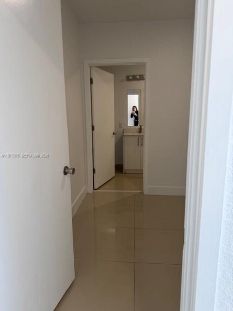 25870 Southwest 144th Court Homestead, FL 33032 - Photo 13 of 46 a view of a hallway with a room
