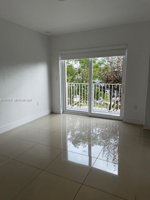 25870 Southwest 144th Court Homestead, FL 33032 - Photo 18 of 46 a view of an empty room with a window