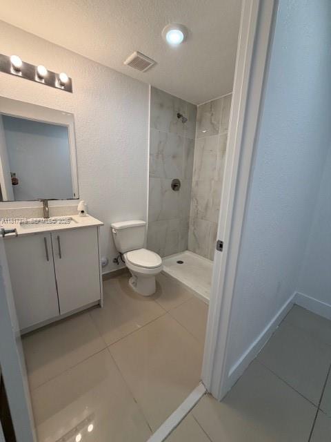 25870 Southwest 144th Court Homestead, FL 33032 - Photo 26 of 46 a bathroom with a sink a toilet and shower