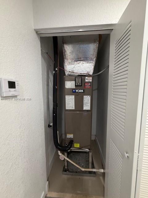 25870 Southwest 144th Court Homestead, FL 33032 - Photo 29 of 46 a room with gym equipment