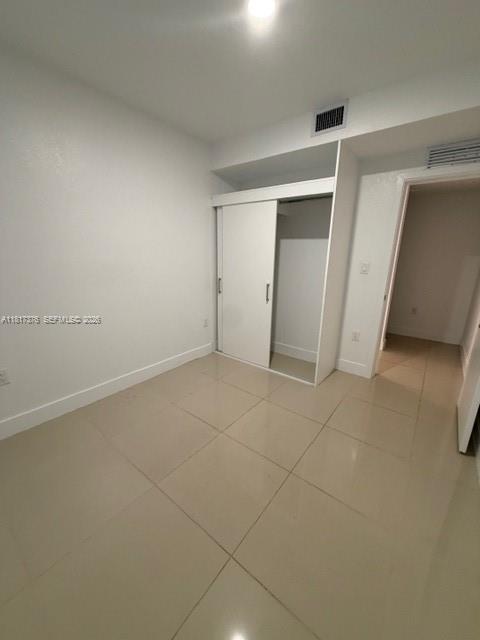 25870 Southwest 144th Court Homestead, FL 33032 - Photo 33 of 46 an empty room with a bathroom