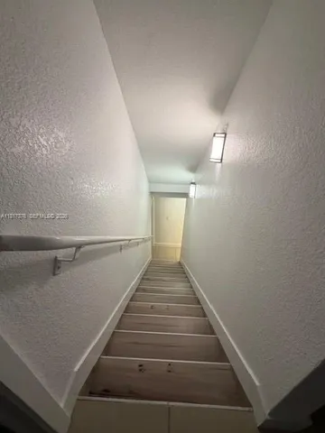 a view of a living room and front door